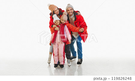 Winter vacation fun. Happy family, parent and children dressed in matching bright winter outfits, ice skating together, laughing 119826248