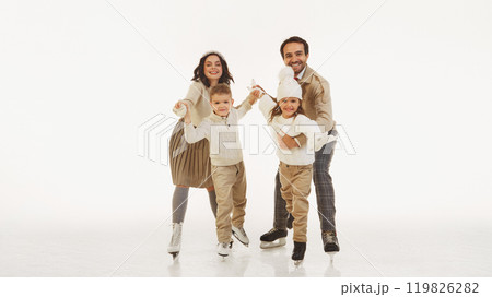 Joyful happy family spending good time with kids, boy and girl. All four dressed in warm stylish winter clothes. Laughter and joy. Joyful happy family spending good time with kids, boy and girl. All four dressed in warm stylish winter clothes. Laughter and joy. 119826282