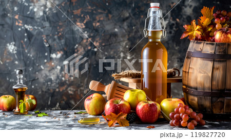 Autumn Harvest Display Featuring Fresh Apples, Cider, and Seasonal Fruits in a Rustic Setting Autumn Harvest Display Featuring Fresh Apples, Cider, and Seasonal Fruits in a Rustic Setting 119827720