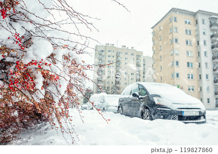A street in Krakow is covered with snow after a blizzard in winter. 119827860