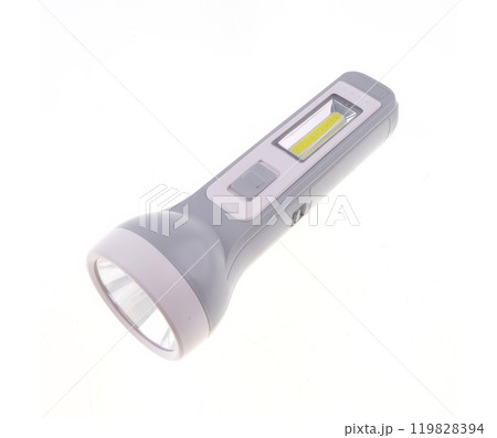 Plastic LED flashlight in green color. Portable flashlight isolate on a white background. 119828394
