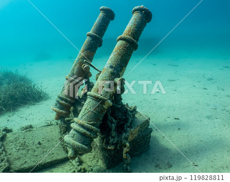 Two old cannons as a part of an artificial reef in the Adriatic Sea. Beautiful turquoise water 119828811