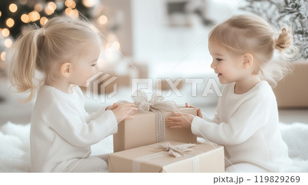 Children with gifts on Christmas or New Year. 119829269