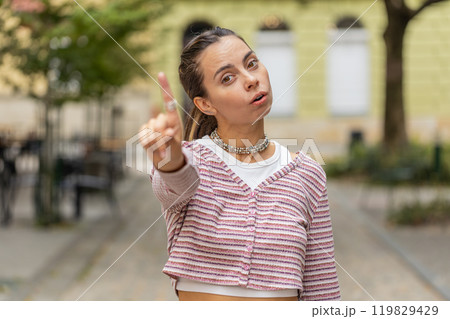 Woman reacting to unpleasant awful idea, dissatisfied with bad quality, wave hand, shake finger No Woman reacting to unpleasant awful idea, dissatisfied with bad quality, wave hand, shake finger No 119829429
