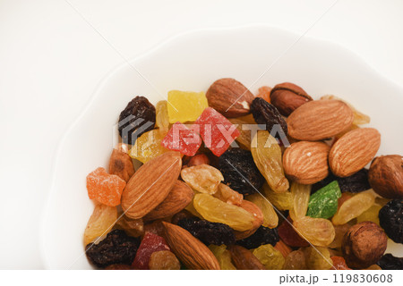 Assorted nuts in a cup. A delicious nutty snack. 119830608