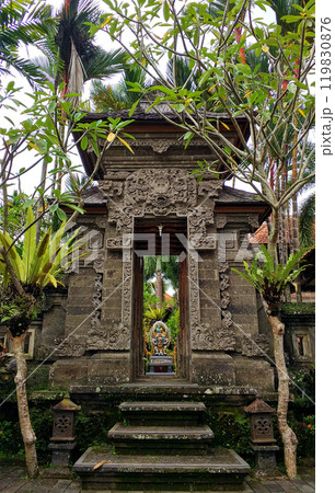 The ritual mystical stone sculptures are covered with moss. Ceremonial temples for offerings on the island of Bali. The ritual mystical stone sculptures are covered with moss. Ceremonial temples for offerings on the island of Bali. 119830876