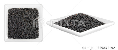 black sesame seeds in ceramic bowl isolated on white background. Top view. Flat lay black sesame seeds in ceramic bowl isolated on white background. Top view. Flat lay 119831192