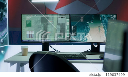 Armed forces military control center showing the North Korea flag, inflicting fear and propaganda among the population. Secret service spreading fake news for communism ideology. Camera A. 119837499