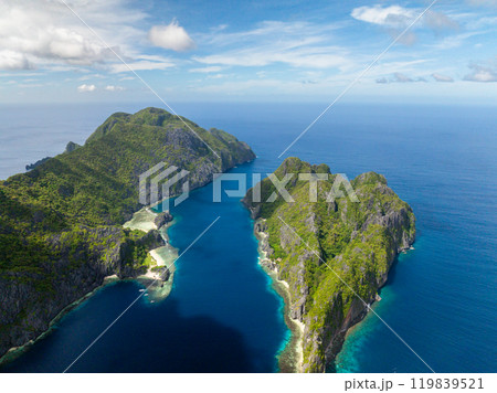 Tropical Islands with blue sea. Tapiutan and Matinloc. El Nido, Philippines. Tropical Islands with blue sea. Tapiutan and Matinloc. El Nido, Philippines. 119839521