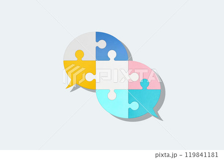 2つの重なる落ち着いたカラーのパズルの吹き出しが中心にある白い背景 119841181