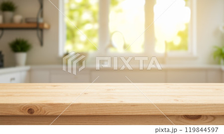 Clean kitchen table setup for product presentation. Blurred modern kitchen background, showcasing cooking blogs, food photography, marketing, product placement 119844597
