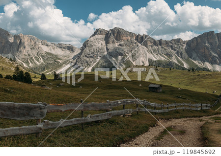 Experience the breathtaking and stunning views of the magnificent Dolomites landscape while exploring its beauty 119845692