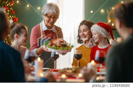 family celebrating Christmas 119848600