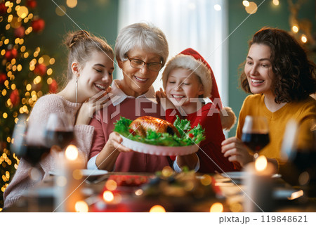 family celebrating Christmas family celebrating Christmas 119848621