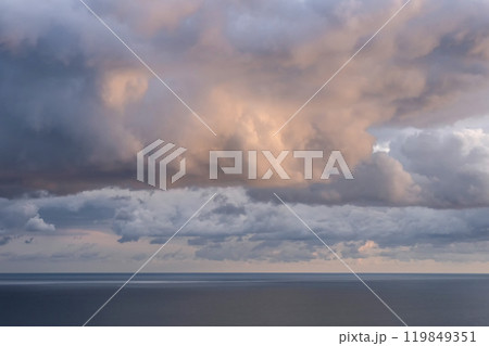 Dramatic sunset with a twilight blue color of the sky and clouds. 119849351