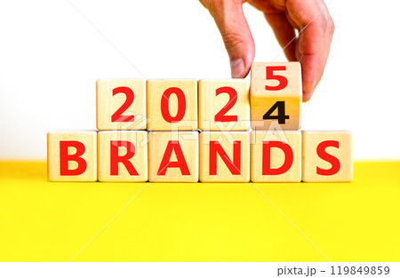 Planning 2025 brands new year symbol. Concept words 2024 Brands to 2025 Brands on beautiful wooden blocks. Beautiful yellow table white background. Business 2025 brands new year concept. Copy space. Planning 2025 brands new year symbol. Concept words 2024 Brands to 2025 Brands on beautiful wooden blocks. Beautiful yellow table white background. Business 2025 brands new year concept. Copy space. 119849859