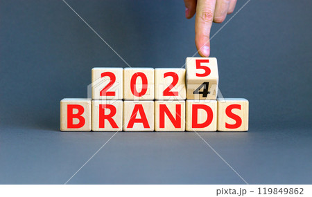 Planning 2025 brands new year symbol. Concept words 2024 Brands to 2025 Brands on beautiful wooden blocks. Beautiful grey table grey background. Business 2025 brands new year concept. Copy space. Planning 2025 brands new year symbol. Concept words 2024 Brands to 2025 Brands on beautiful wooden blocks. Beautiful grey table grey background. Business 2025 brands new year concept. Copy space. 119849862