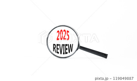 Planning 2025 review new year symbol. Concept words 2025 Review on beautiful white paper in magnifying glass. Beautiful white paper background. Business 2025 review new year concept. Copy space. Planning 2025 review new year symbol. Concept words 2025 Review on beautiful white paper in magnifying glass. Beautiful white paper background. Business 2025 review new year concept. Copy space. 119849887
