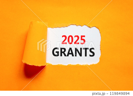 Planning 2025 grants new year symbol. Concept words 2025 Grants on beautiful white paper. Beautiful orange paper background. Business 2025 grants new year concept. Copy space. Planning 2025 grants new year symbol. Concept words 2025 Grants on beautiful white paper. Beautiful orange paper background. Business 2025 grants new year concept. Copy space. 119849894