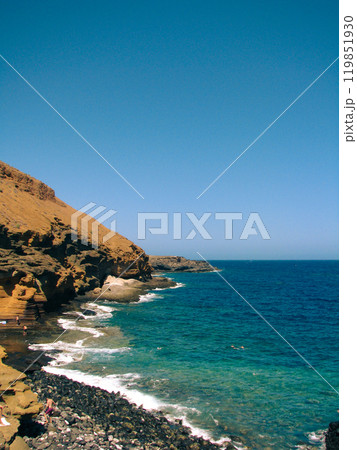 Beach Amarilla on Canary Island. Blue ocean and mountain Beach Amarilla on Canary Island. Blue ocean and mountain 119851930