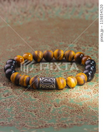 Black Obsidian stone bracelet , Chinese men's modern retro style fashion. Isolated on white background 119854520