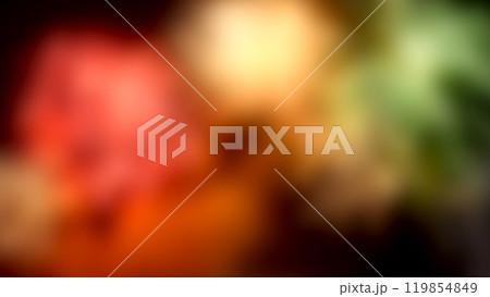 Blurred light background. Colorful lighting in green, gold and red tone in blurred background. 119854849