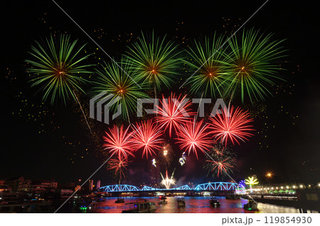 Fireworks festival at Memorial bridge cross the Chao Phraya river, Bangkok, Thailand. 119854930