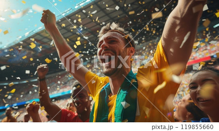 A man is celebrating with confetti falling around him A man is celebrating with confetti falling around him 119855660