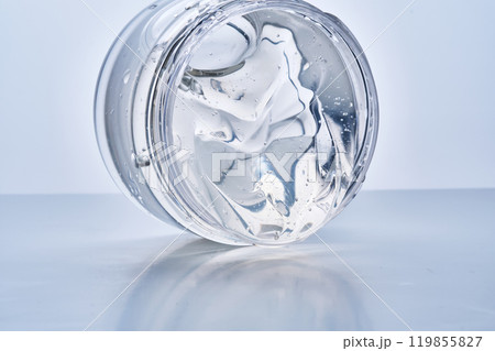 Texture of the gel in the jar. Hair gel or hyaluronic gel for the face. Texture of the gel in the jar. Hair gel or hyaluronic gel for the face. 119855827