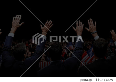 A group of people are holding up their hands in the air A group of people are holding up their hands in the air 119855829
