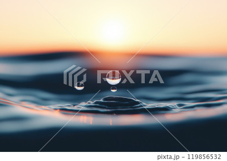 Water droplets resting on a tranquil surface during sunset capturing the serene beauty and clarity of nature's design in a moment of peace Water droplets resting on a tranquil surface during sunset capturing the serene beauty and clarity of nature's design in a moment of peace 119856532