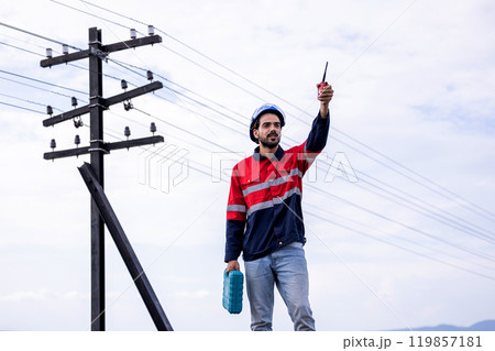 Electrical engineer man checking Power at Contruction Site. electrical engineer inspect the electrical systems at the equipment site 119857181