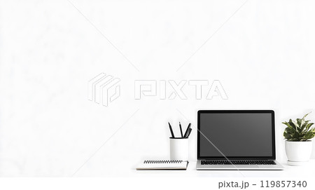 Minimalistic home office desk setup featuring laptop Minimalistic home office desk setup featuring laptop 119857340
