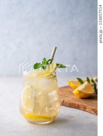 Mojito cocktail with fresh lemon, mint and ice. Refreshing citrus lemonade drink  119857514