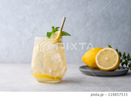 Mojito cocktail with fresh lemon, mint and ice. Refreshing citrus lemonade drink  119857515
