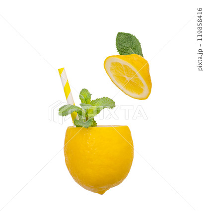 Juicy lemon with mint leaves and a paper straw in the form of a cup on a light isolated background. Juicy lemon with mint leaves and a paper straw in the form of a cup on a light isolated background. 119858416