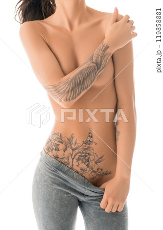 Slim tattooed girl topless isolated shot 119858881