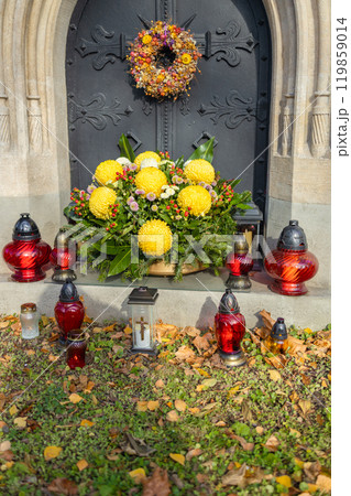Decorated graves at a cemetery on All Saints Day (Wszystkich Swietych) in Poland. 119859014
