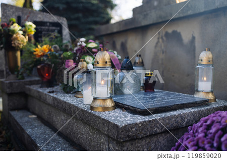 Decorated graves at a cemetery on All Saints Day (Wszystkich Swietych) in Poland. 119859020