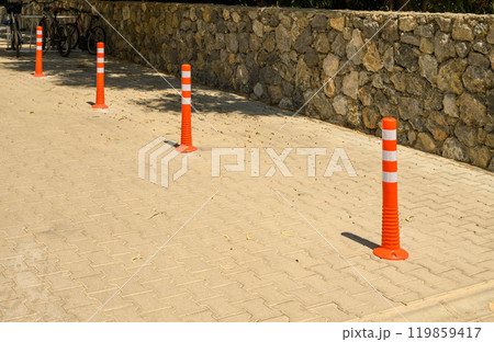 Sidewalk anti-parking bollards with reflective tape in the parking lot 11 Sidewalk anti-parking bollards with reflective tape in the parking lot 11 119859417
