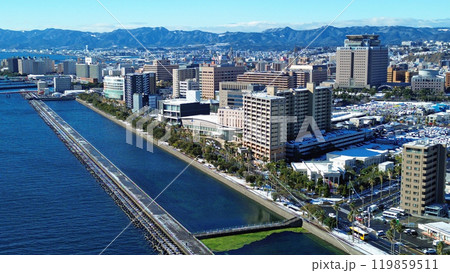 鹿児島市鴨池新町の積雪の街並みの空撮 119859511