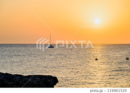 Beautiful sunset with orange sky on the beach of Menorca, Balearic Islands. Sunset, nature 119861520