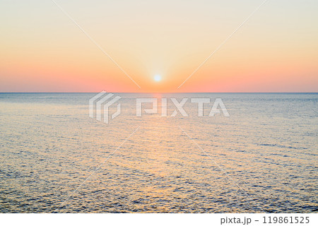 Beautiful sunset with orange sky on the beach of Menorca, Balearic Islands. Sunset, nature Beautiful sunset with orange sky on the beach of Menorca, Balearic Islands. Sunset, nature 119861525
