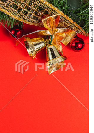 Christmas composition, decorative branches, bells, red balls Christmas composition, decorative branches, bells, red balls 119863944