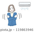 エアコンの寒さに肩をすくめて震えている青いカーディガンの女性 119863946