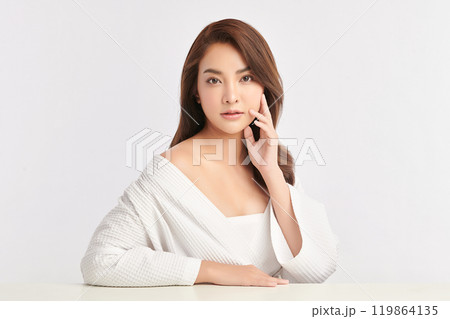 Beautiful young asian woman with clean fresh skin on white background, Face care, Facial treatment, Cosmetology, beauty and spa, Asian women portrait. Beautiful young asian woman with clean fresh skin on white background, Face care, Facial treatment, Cosmetology, beauty and spa, Asian women portrait. 119864135
