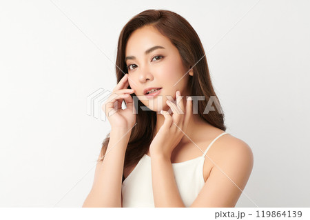Beautiful young asian woman with clean fresh skin on white background, Face care, Facial treatment, Cosmetology, beauty and spa, Asian women portrait. Beautiful young asian woman with clean fresh skin on white background, Face care, Facial treatment, Cosmetology, beauty and spa, Asian women portrait. 119864139