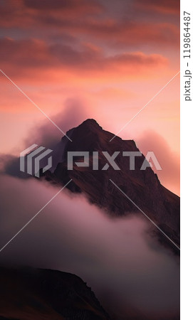 Beautiful top of mountain surrounded by clouds. Generative AI 119864487