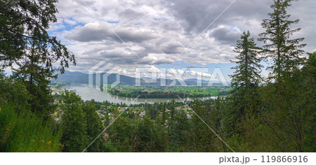 View of the Mission town with Fraser River, lush green valley and the mountains in the background - Fraser Valley, BC, Canada 119866916