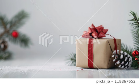 A Christmas present wrapped beautifully with a red bow sits elegantly. AI-generated content. 119867652